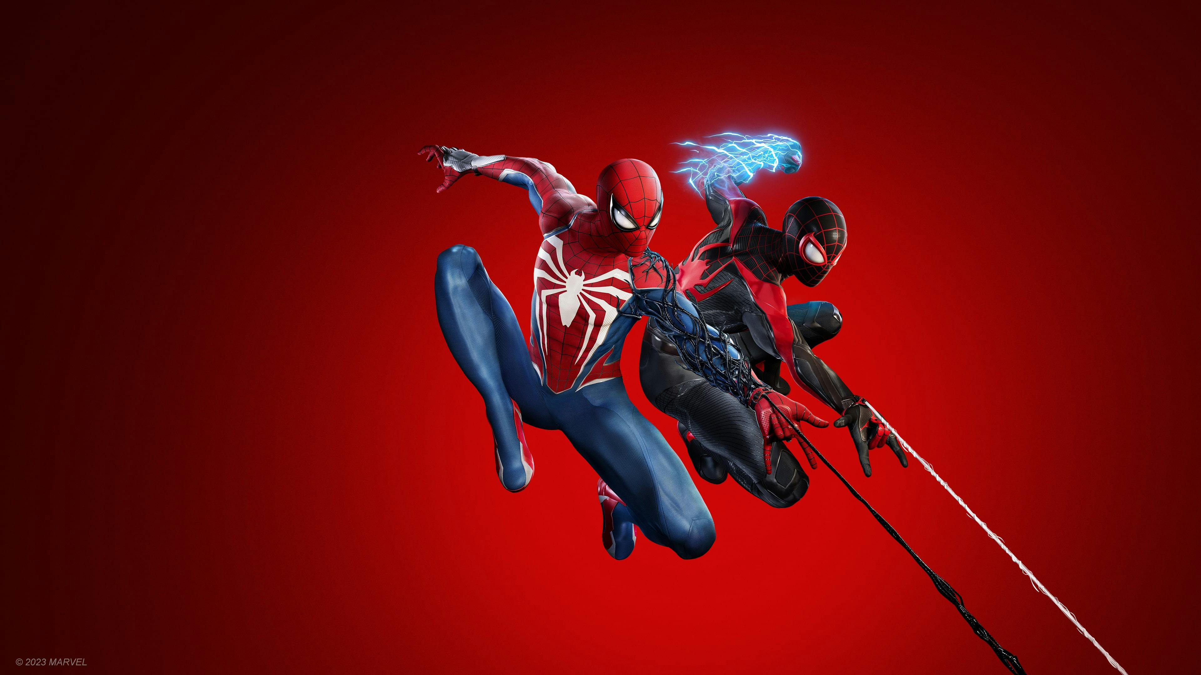 Spiderman 2 key art featuring Peter Parker and Miles Morales suited up side by side.