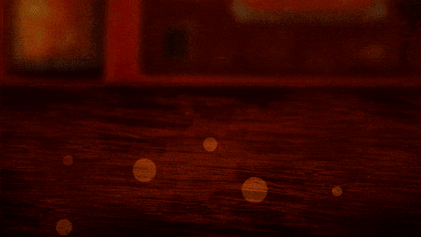 Gif of coins dropping onto the table and sparkling. A pair of hands comes in to grab the money.
