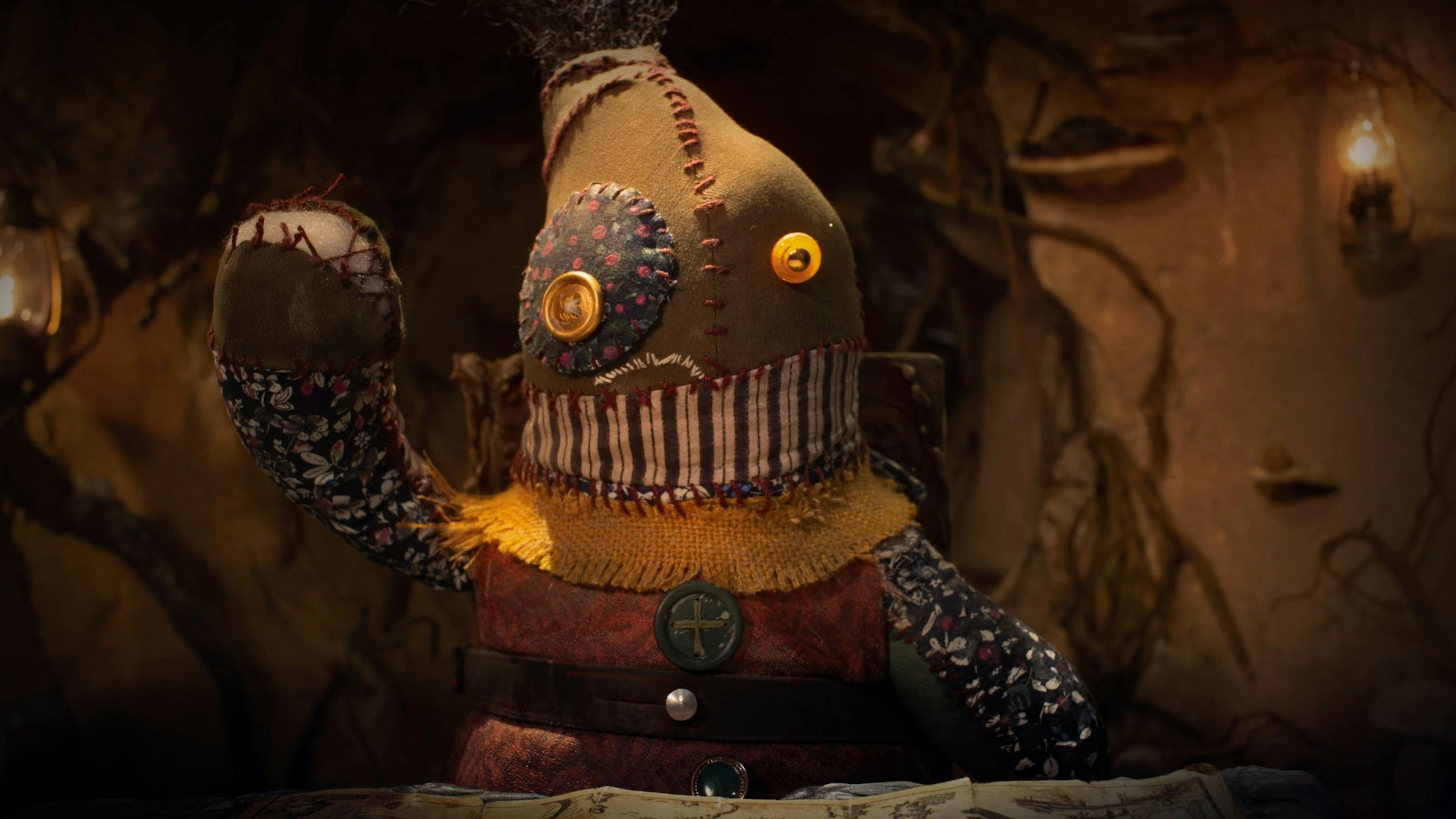 Crouton from South of Midnight. He's a sack doll thing with button eyes. Looks messy in a loveable way.