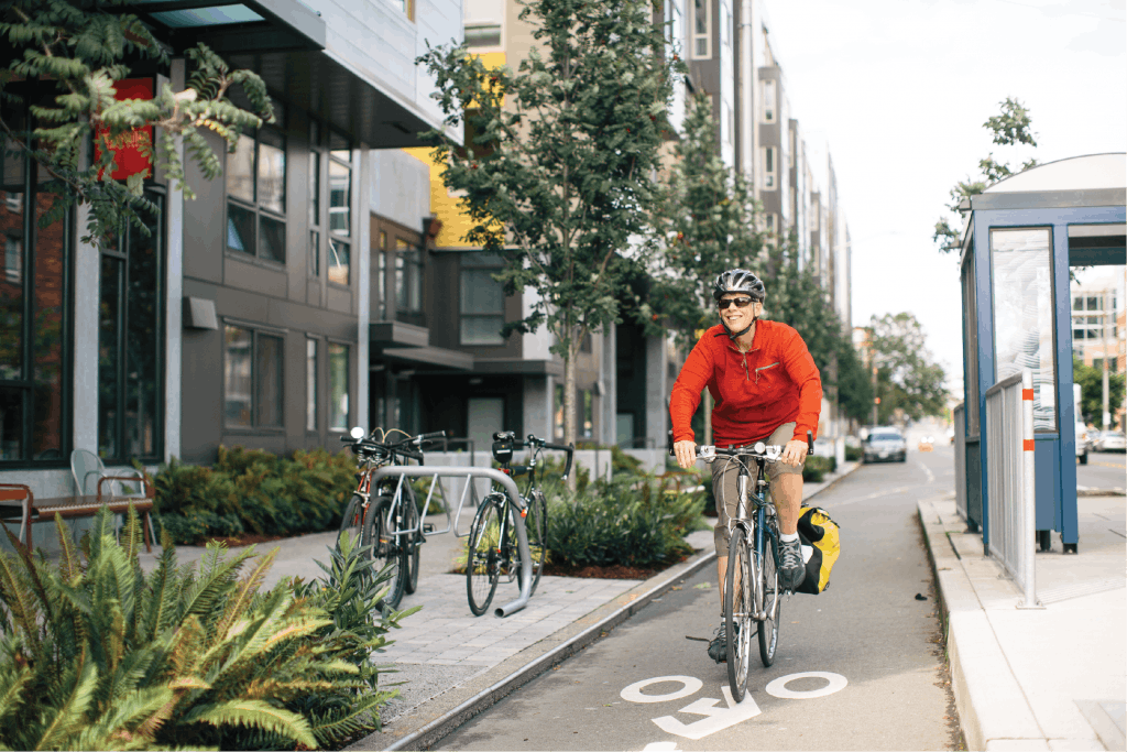 A cyclist rides in a bike lane.