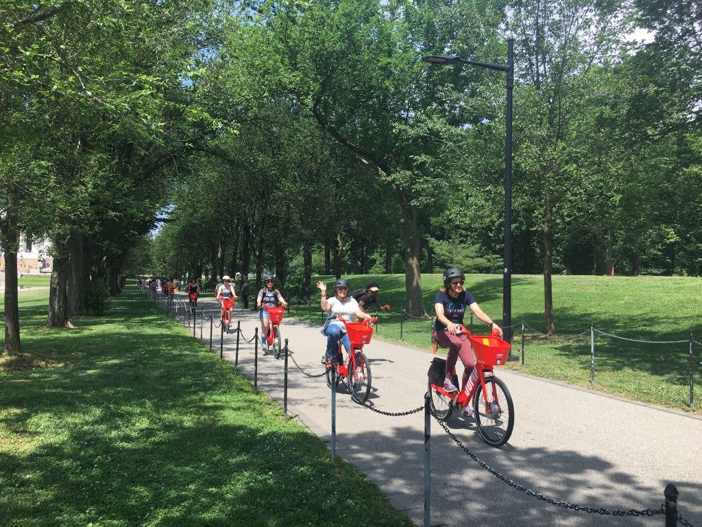 Fly-in participants cruise the National Mall on JUMP e-bikes.