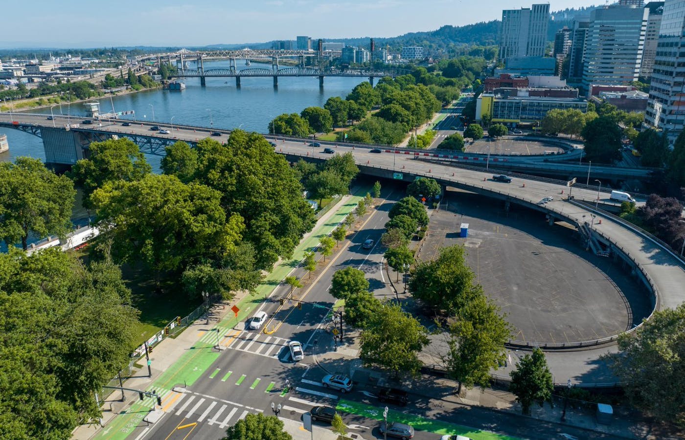 From Bloomington, Indiana to Portland, Oregon (pictured above), protected bike lanes of all shapes and sizes transformed U.S. communities in 2022. (Photo Credit: David Evans and Associates, Inc.)