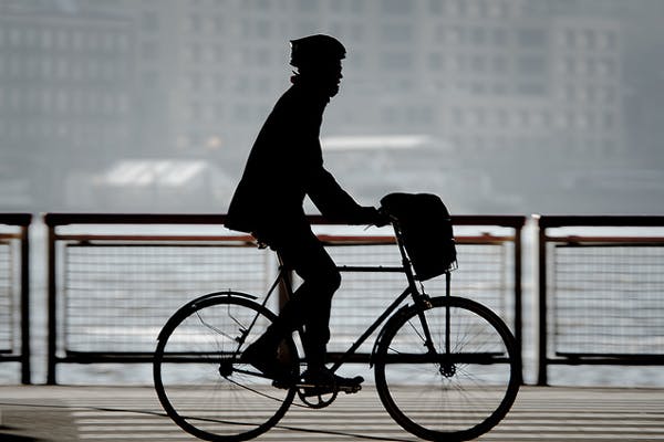 A rider in silhouette.