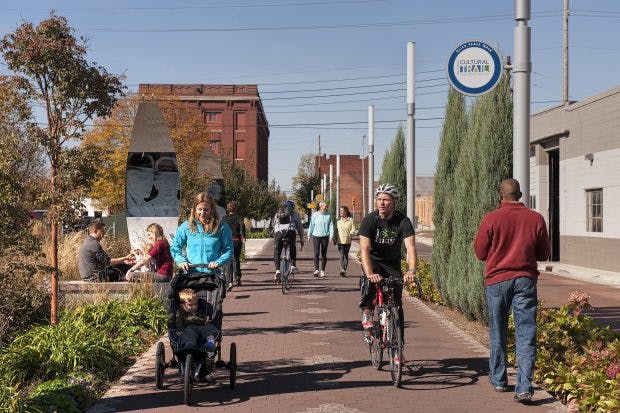 Pedestrians and bikers on the Indianapolis Cultural Trail.