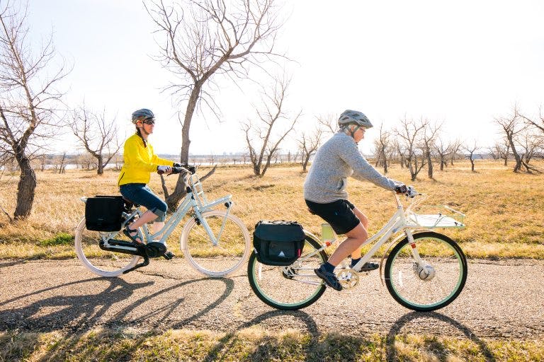 Electric bikes make long-distance tours accessible to a broader audience.
