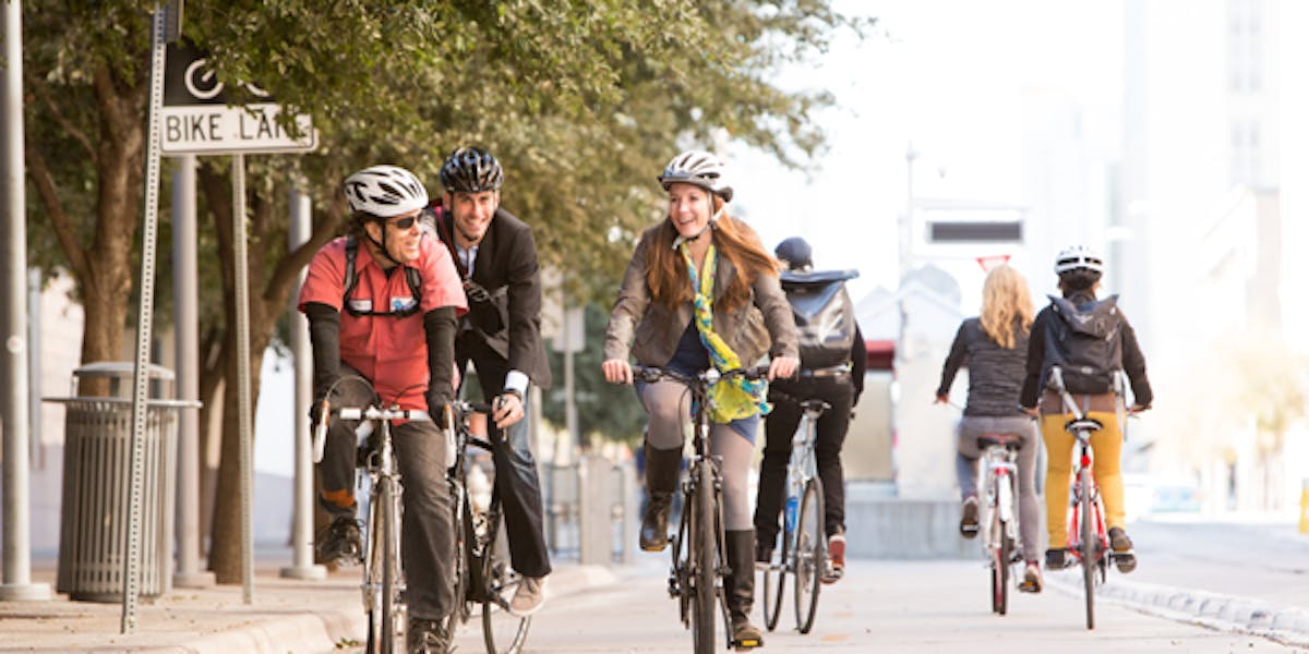 Bikers in a bike lane.