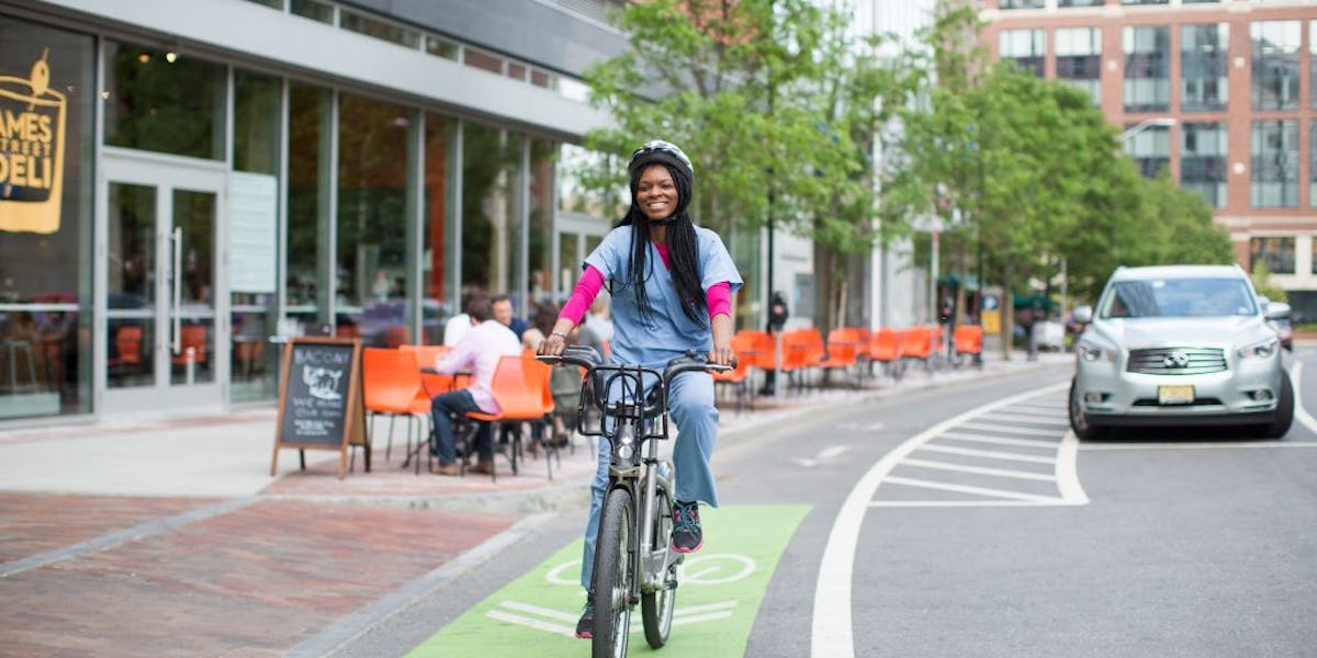 Medical professional using a bike lane to get around town