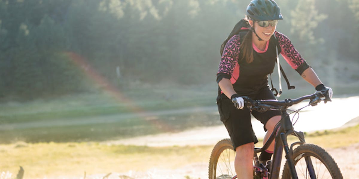 Mountain biker in a meadow