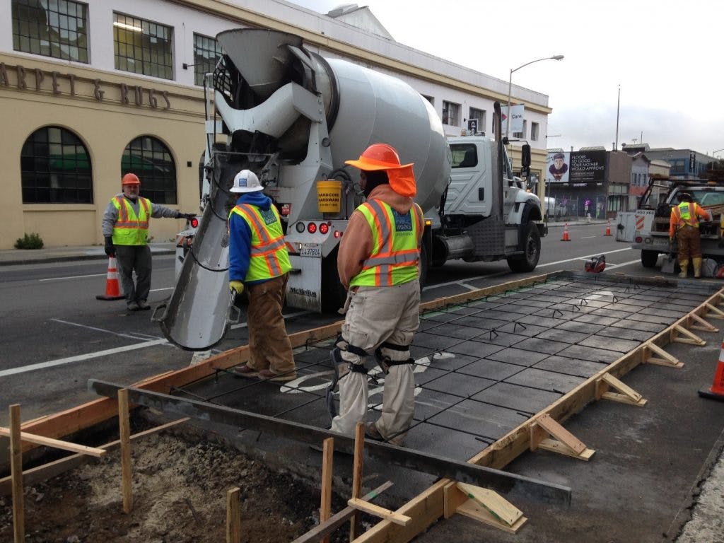 Pouring a bus boarding island. 