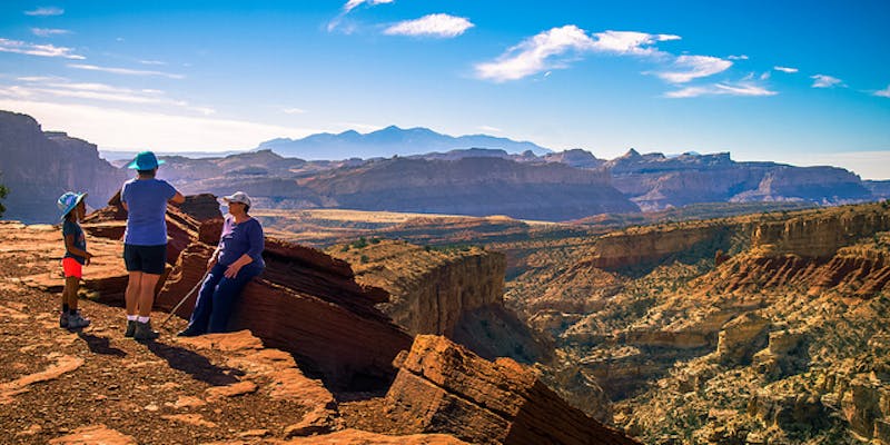 Mother, daughter and grandmother take in the scenery at Capitol Reef National Park. Source: Ian D. Keating; Flickr.