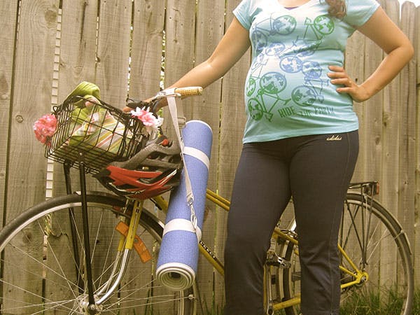 Pregnant woman on bicycle