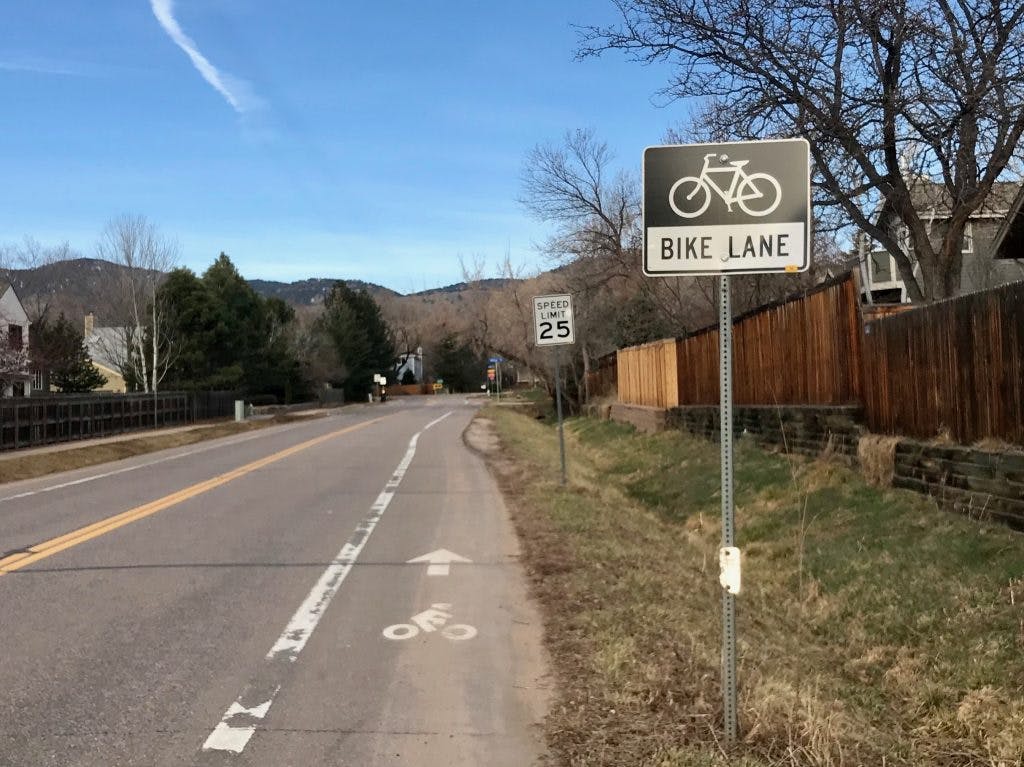 Bike lane and speed limit sign