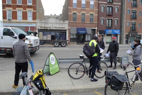 Residents celebrate a new protected bike lane on Lake Street with a community bike ride led by Alderman Burnett and Active Trans, in partnership with local community-based organizations.