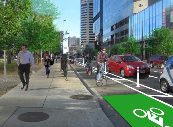 A Denver business group is soliciting contributions for this protected bike lane on Denver’s Arapahoe Street. Rendering: Alta Planning + Design.