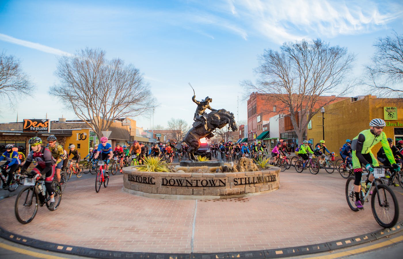 A flock of riders depart Stillwater, Oklahoma, for the Mid South gravel race.
