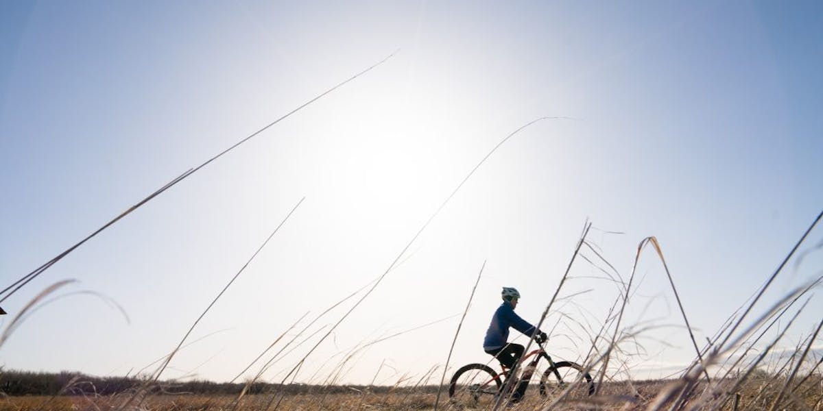 E-biker going across a field