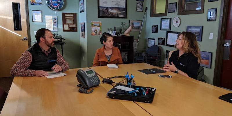 (From left) Steve Heal, Wheat Ridge Cyclery; Annie Larson, regional director for U.S. Senator Cory Gardner; and PeopleForBikes government relations coordinator Jordan Trout meet to discuss how current federal legislation affects bike businesses.