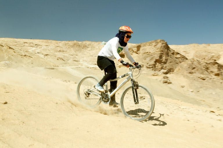 A woman rides in the Hindukush MTB Challenge.