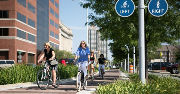 Indianapolis Cultural Trail create the feeling of an off-street trail in the middle of a Midwestern downtown