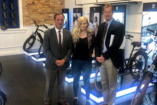 (Left to right) Congressman Chris Stewart (UT-02) with Skye Willard, Director of BPM at Magnum Bikes, and Gary Webster, the Congressman's Division Director.