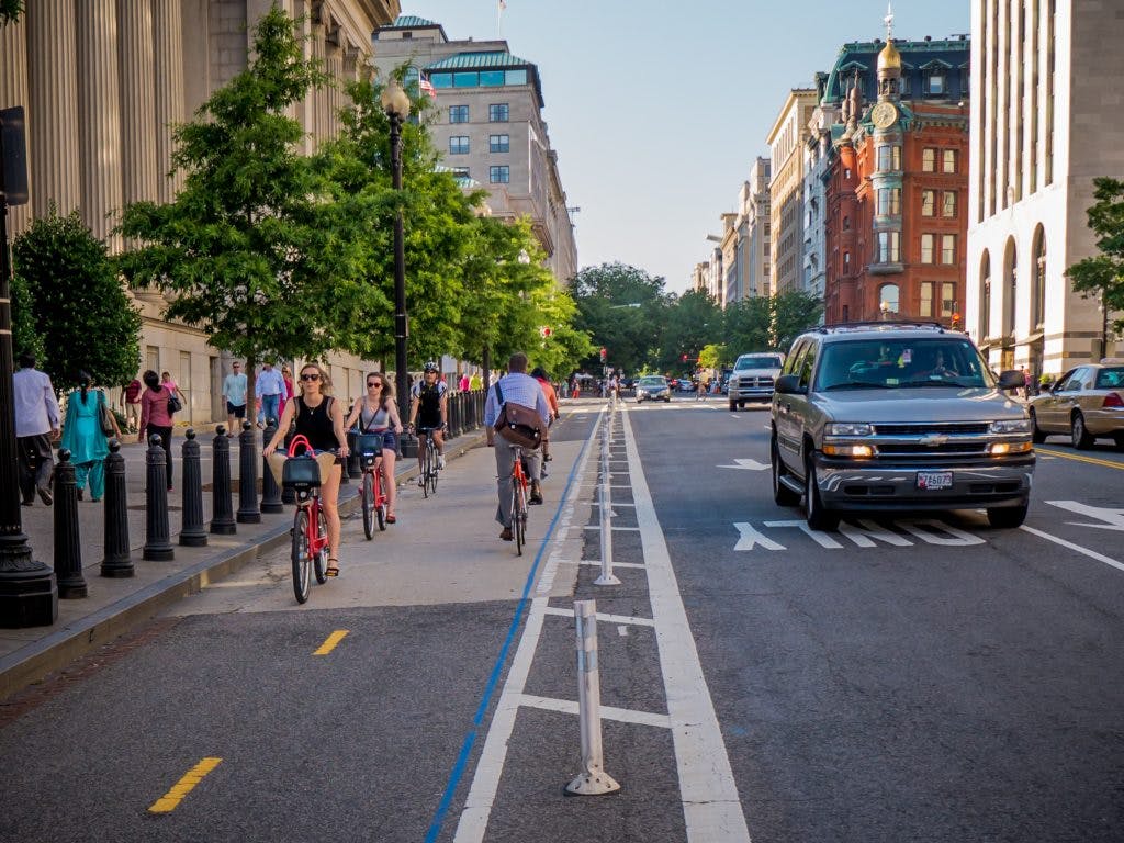 Bike riders enjoy a protected lane in Washington, D.C.