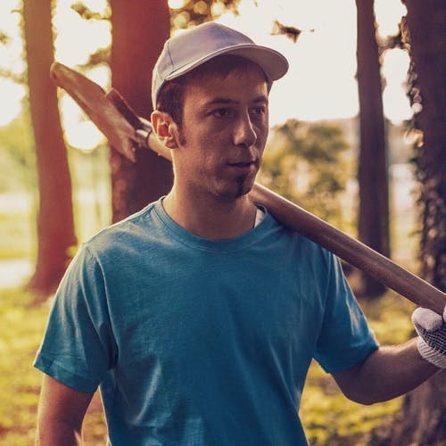 Man with log