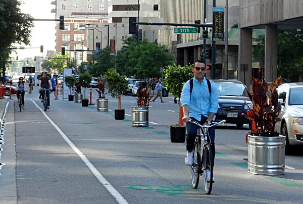 People biking in Denver