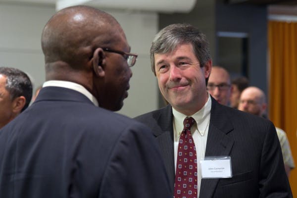 John Cameron, right, in 2012