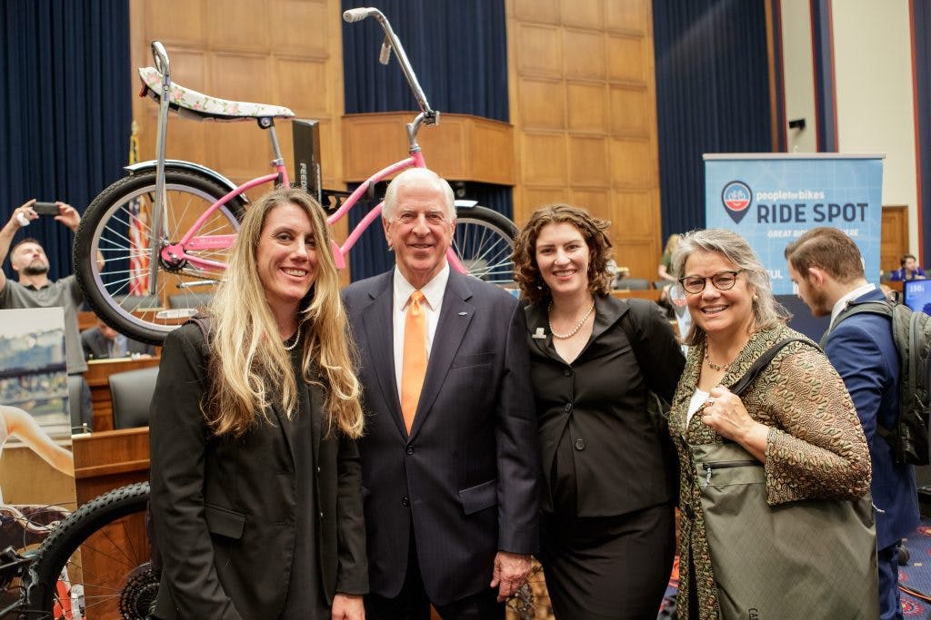 Camelbak's Jamie Lynn Furrer (left) and Kelsey Hammond (second from right) pose with Rep. Mike Thompson (D-CA) during the Congressional Bike Fest. Furrer and Hammond also met with Thompson's office during their day of meetings.