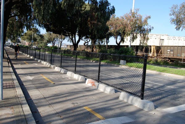 fence barrier bike lane in SF