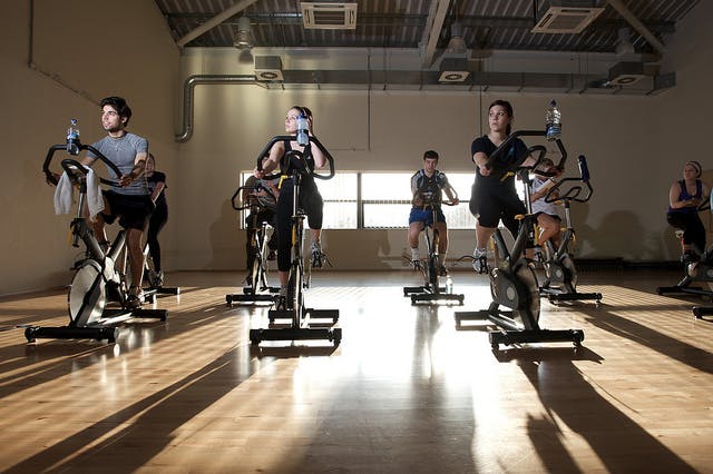 Indoor biking classes are a great way to keep cycling in the winter months.