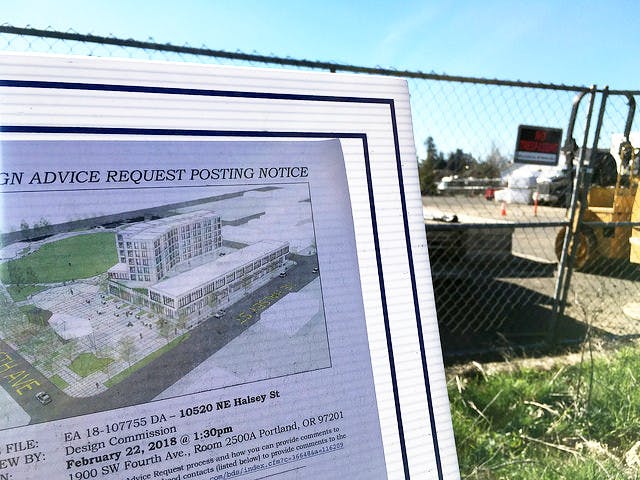 A public meeting announcement posted at the future site of Gateway Discovery Park.