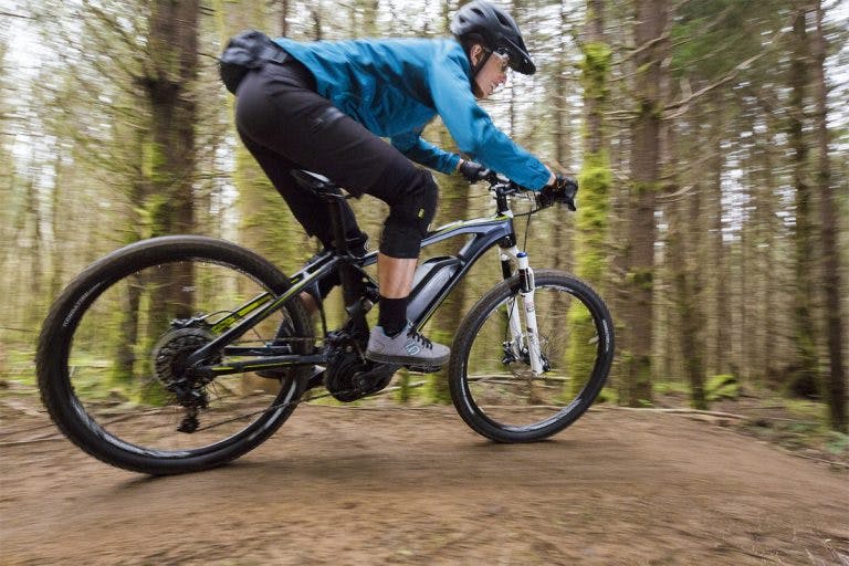 Riding an electric mountain bike.