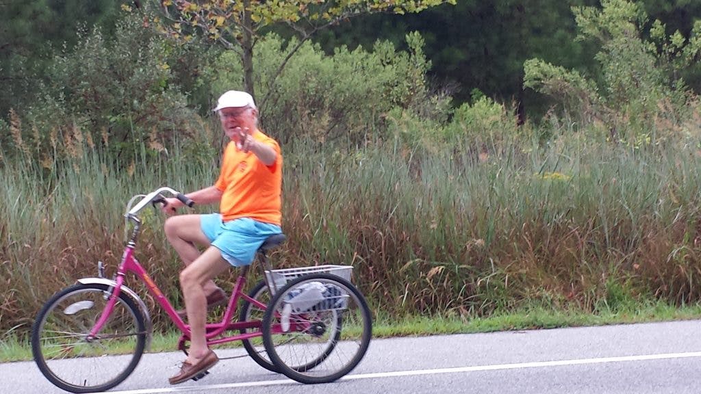 An older cyclist on a trike using the Indiana Cultural Trail.