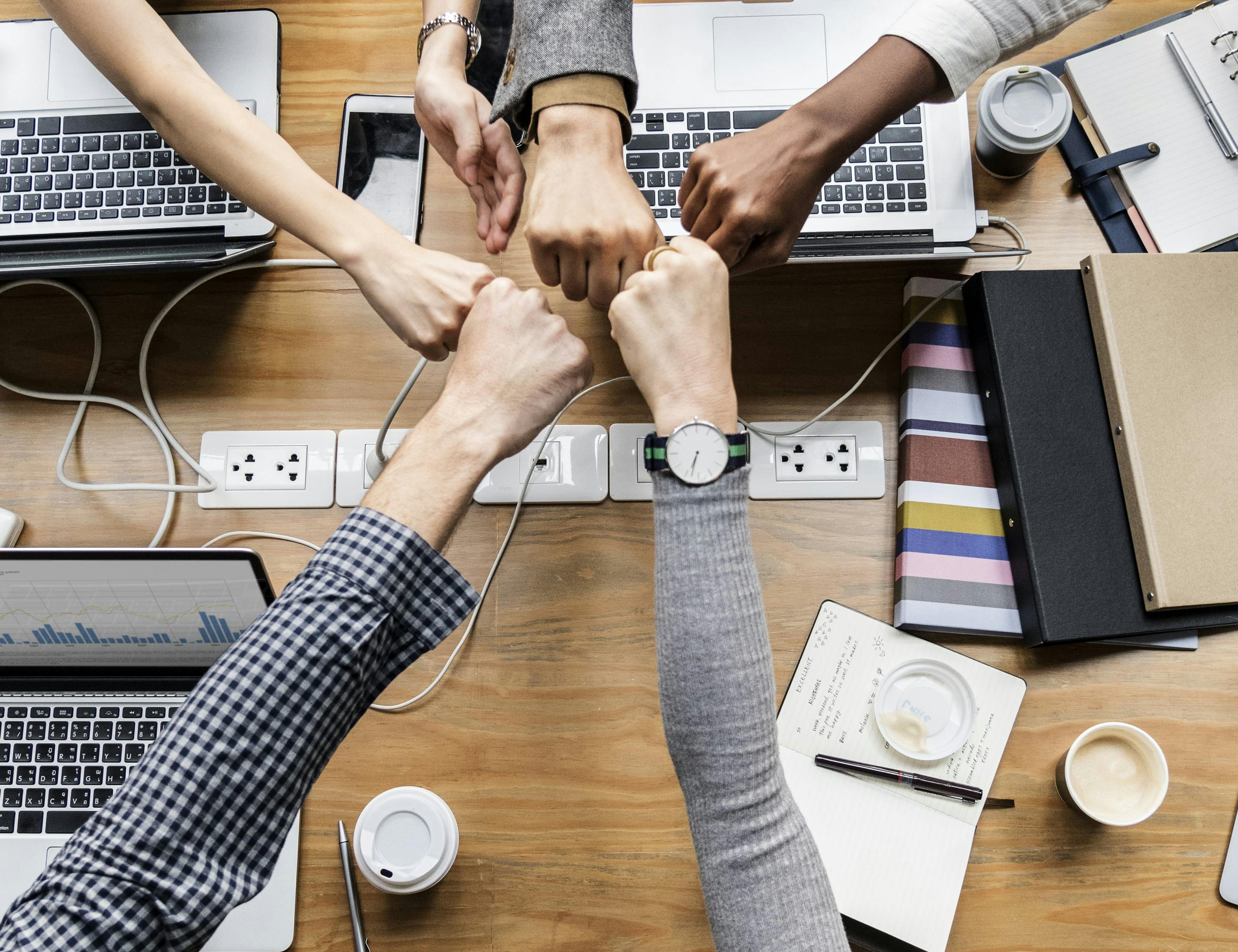 real estate agent fist-bumping