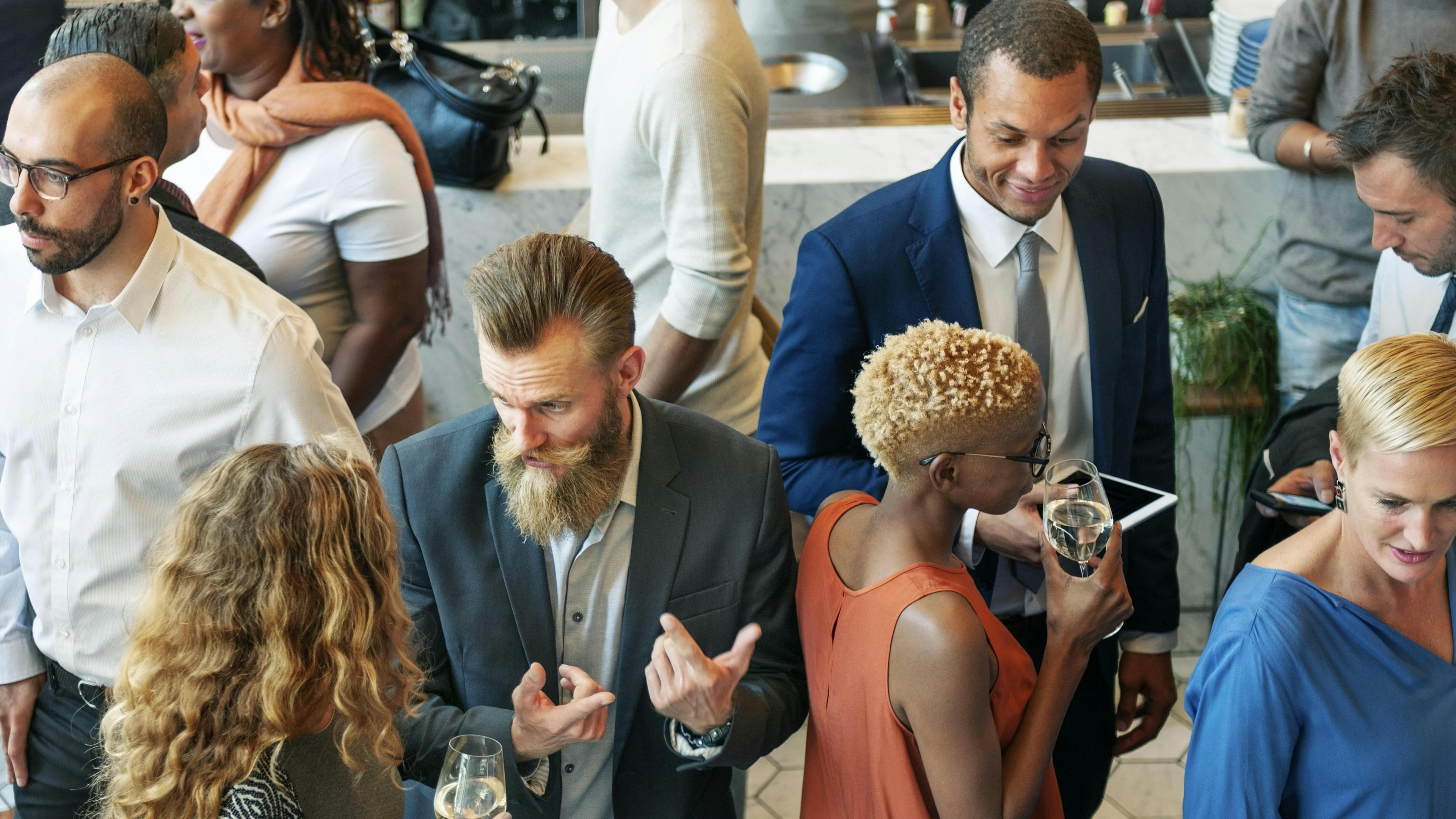 People networking at a professional event.