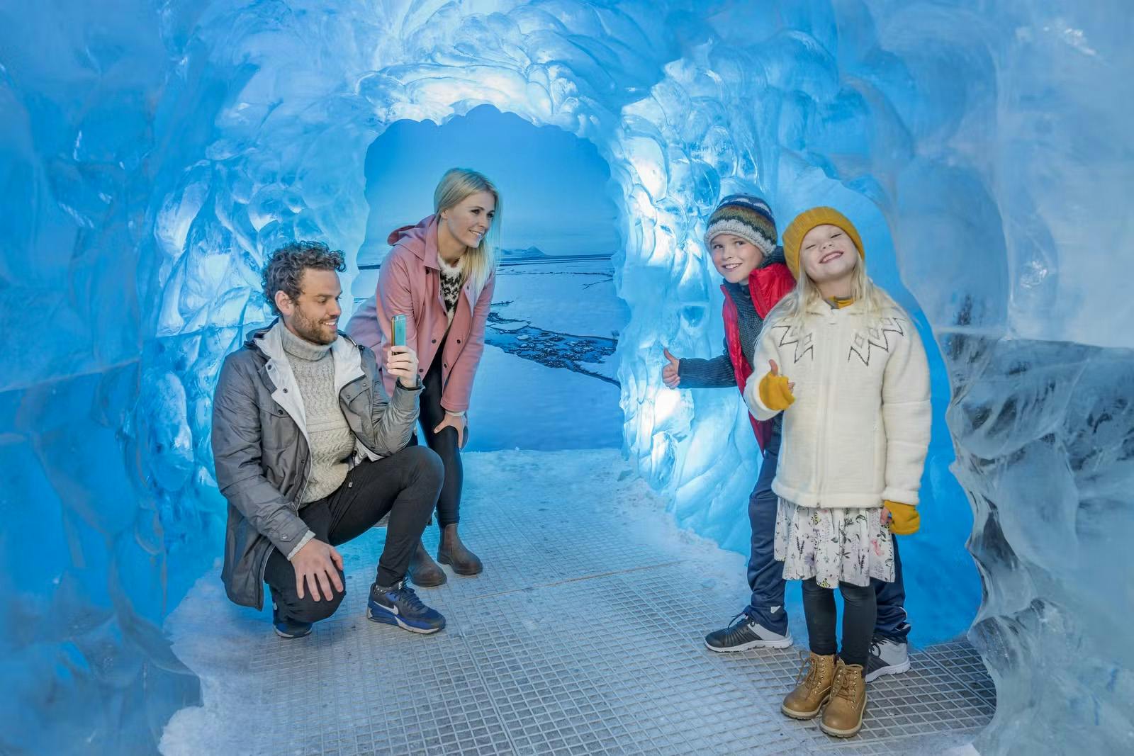 Family in the ice cave at Perlan