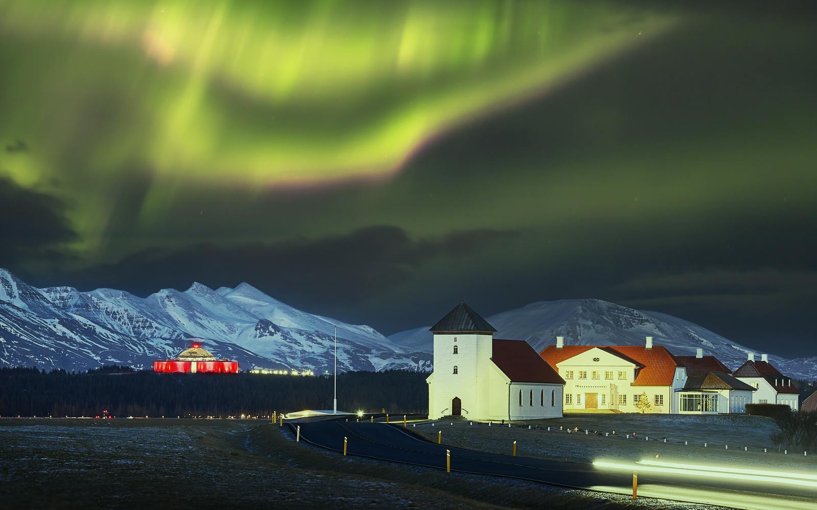 Northern lights over Bessastadir and Perlan