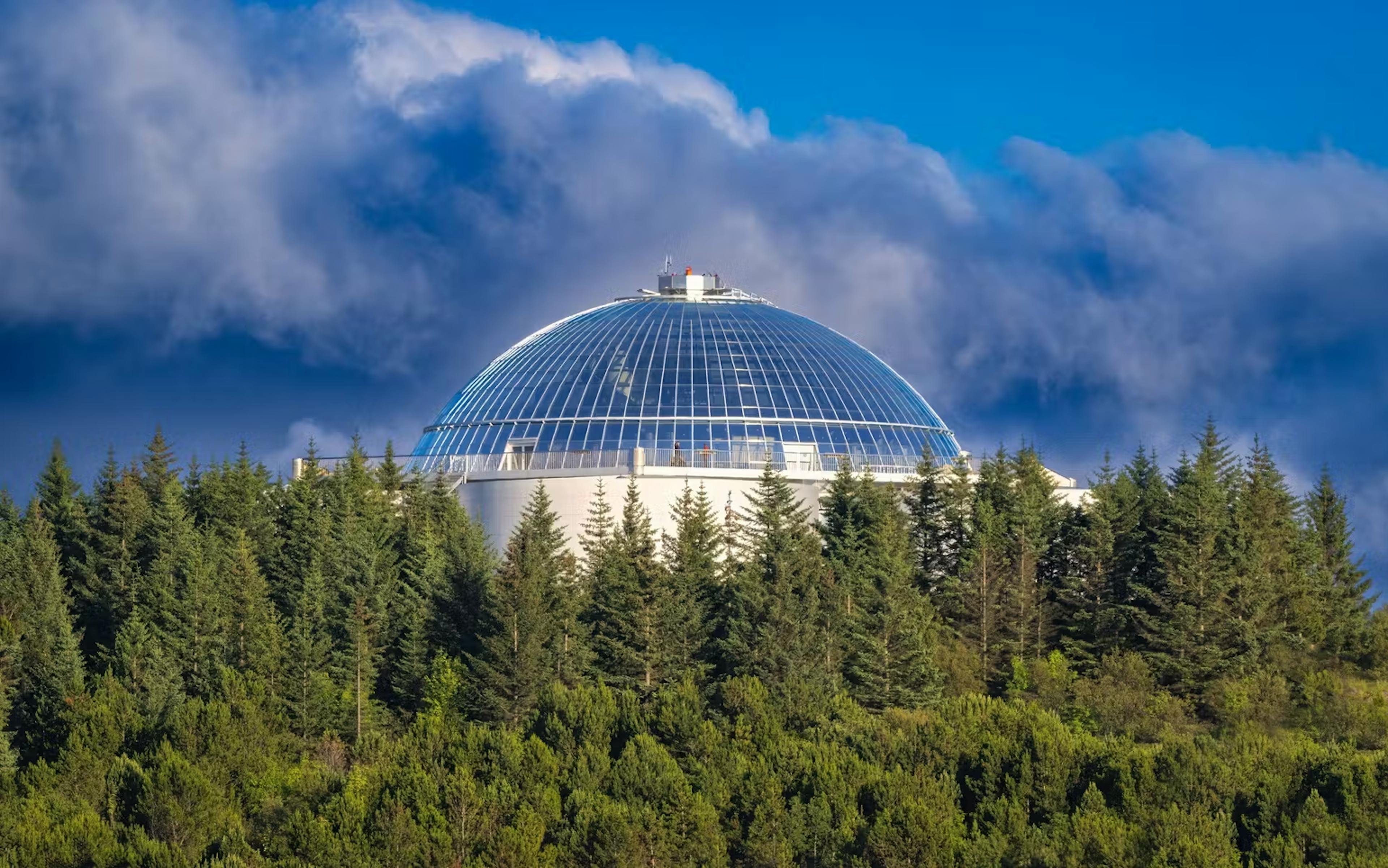 Perlan surrounded by forest