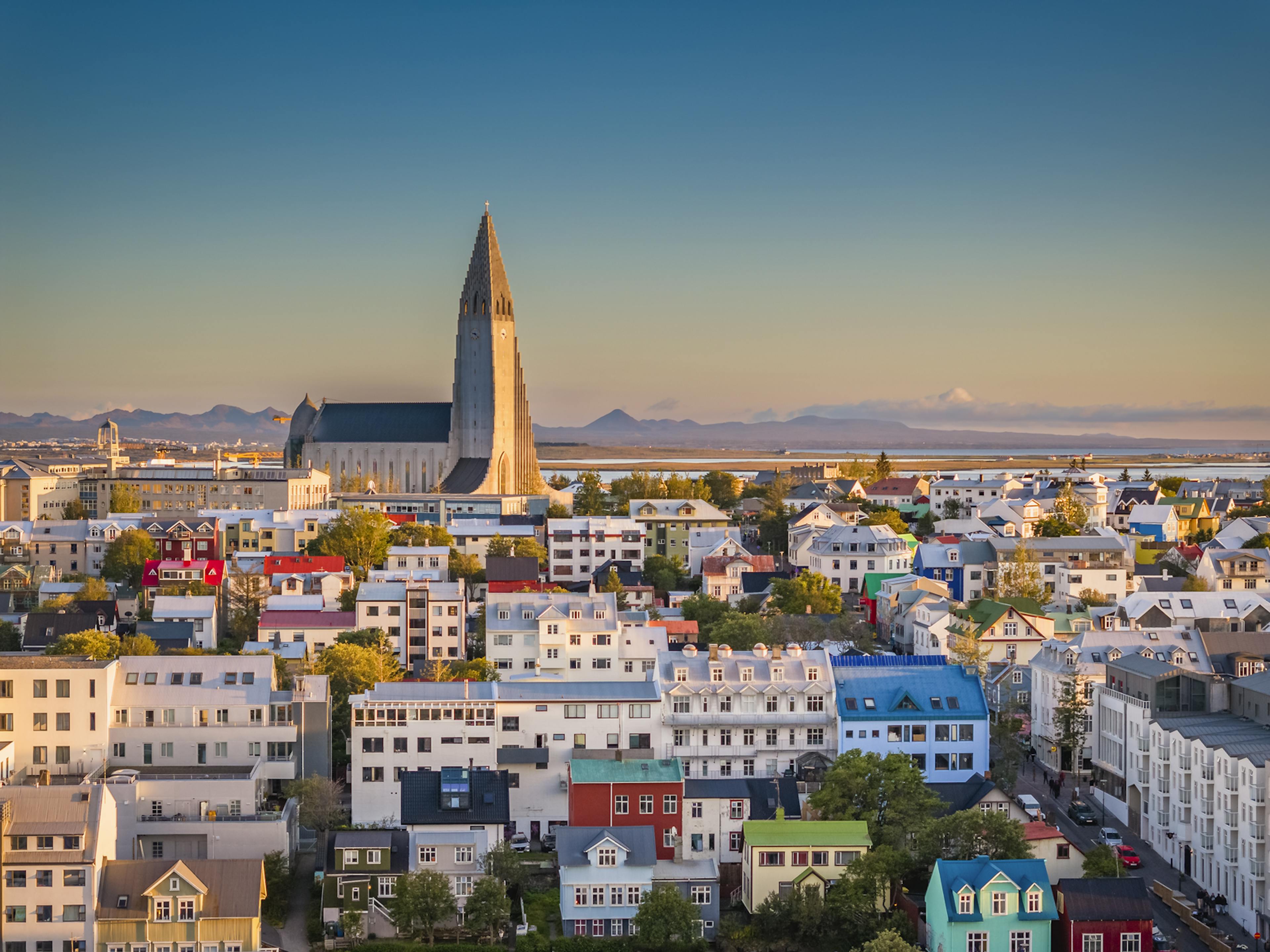 hallgrímskirkja overlooking town during dusk
