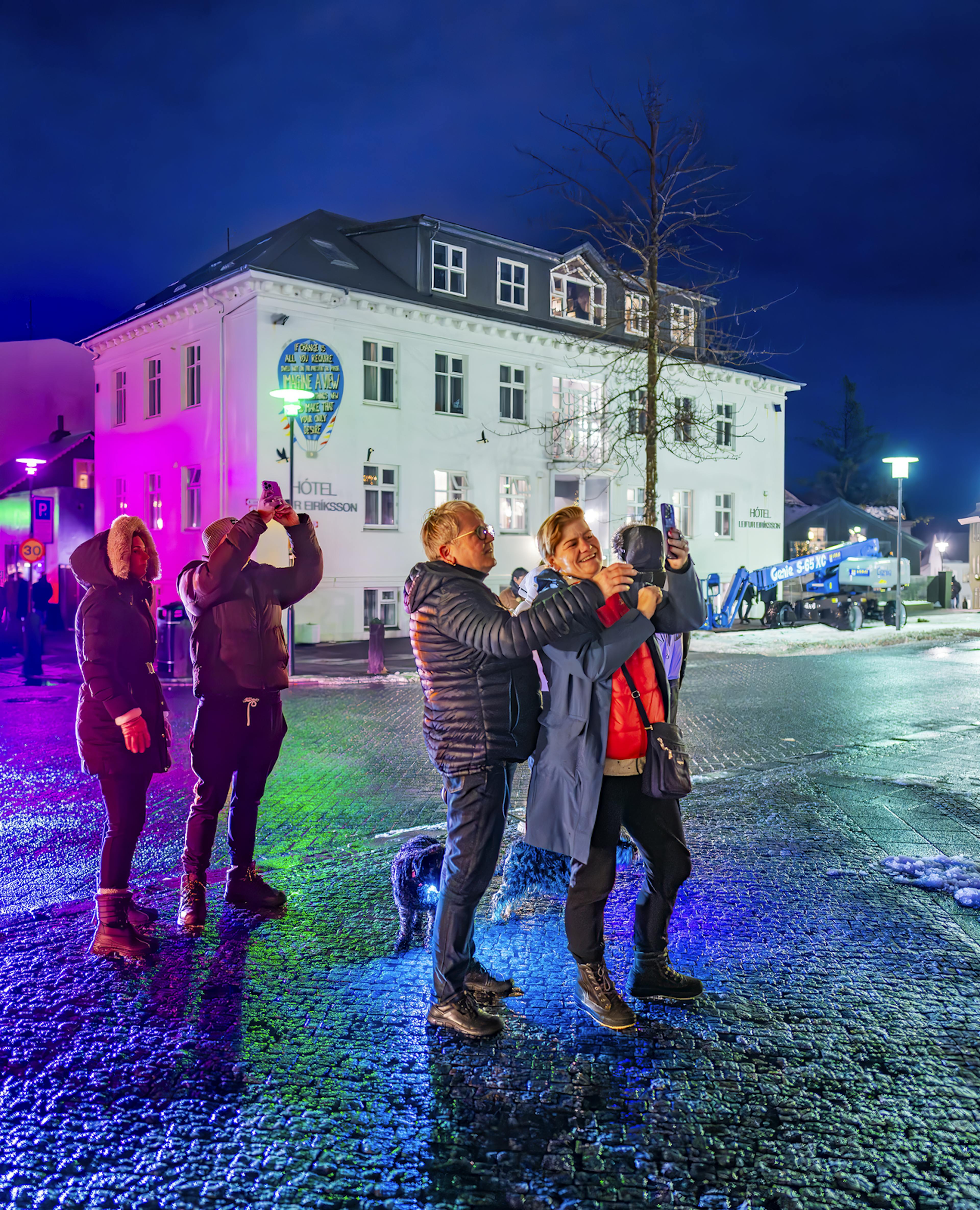 Tourists in Reykjavik at night 