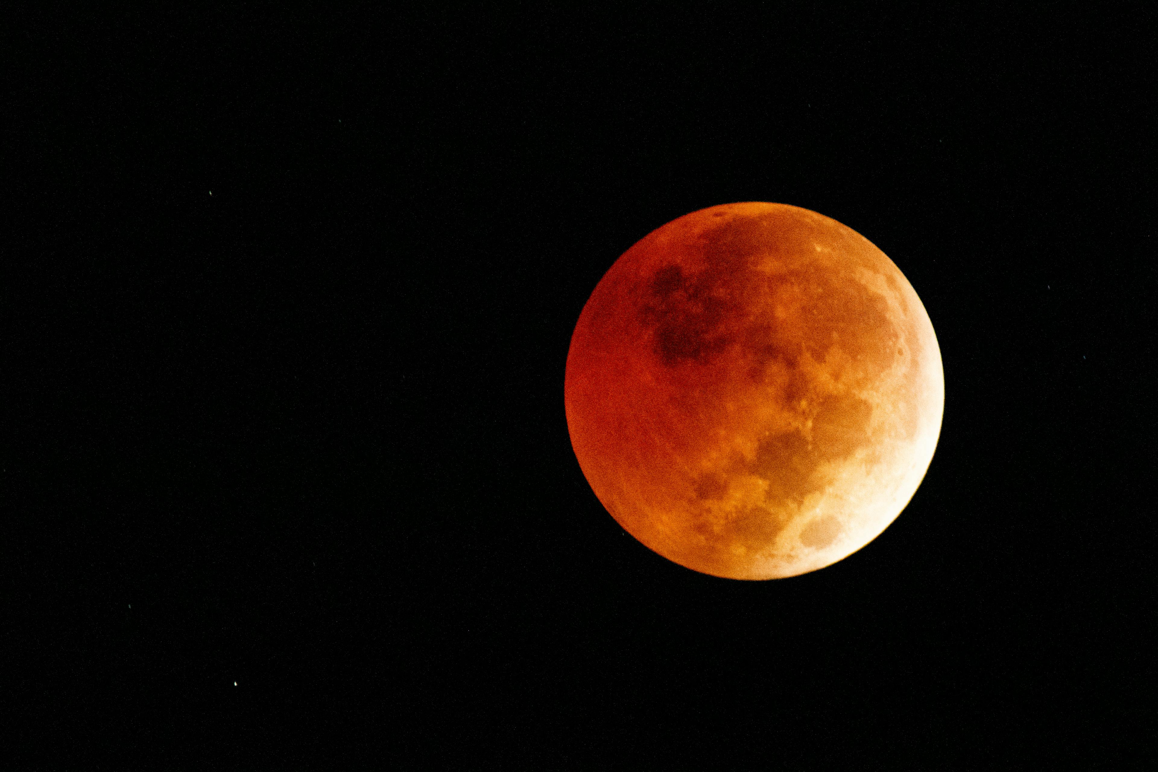 total lunar eclipse (blood moon) - orangey red moon