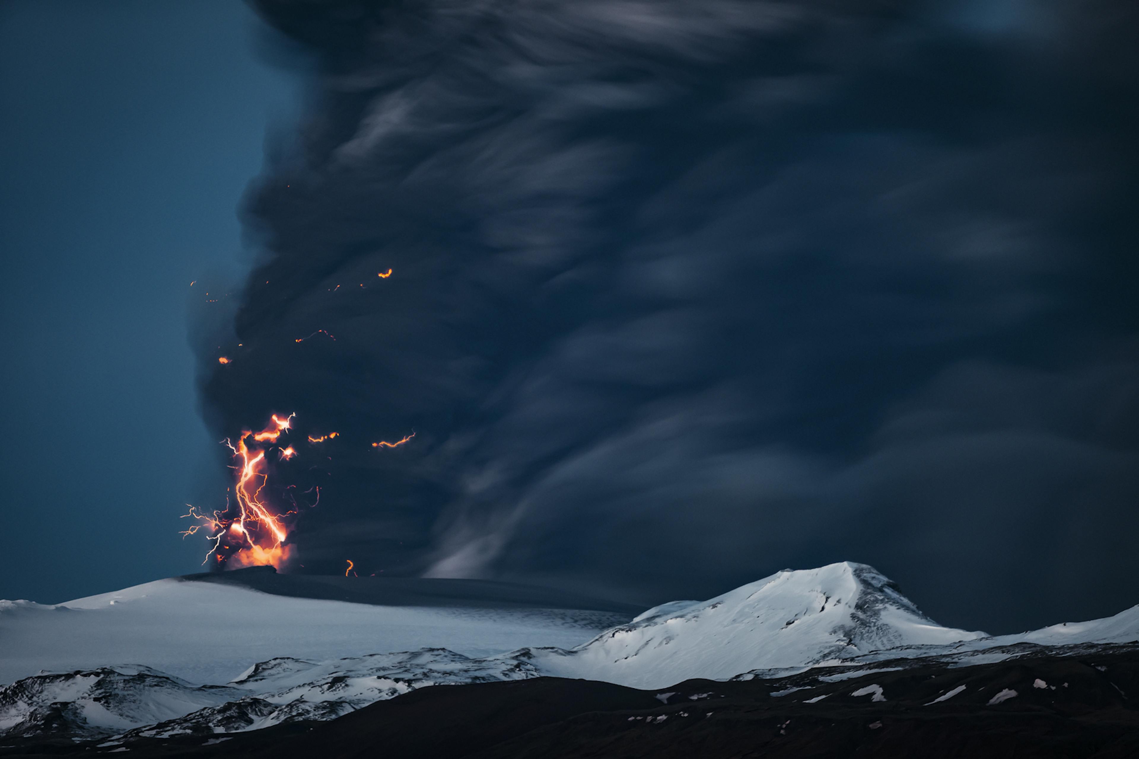 phreatic eruption with lightning and black ash cloud