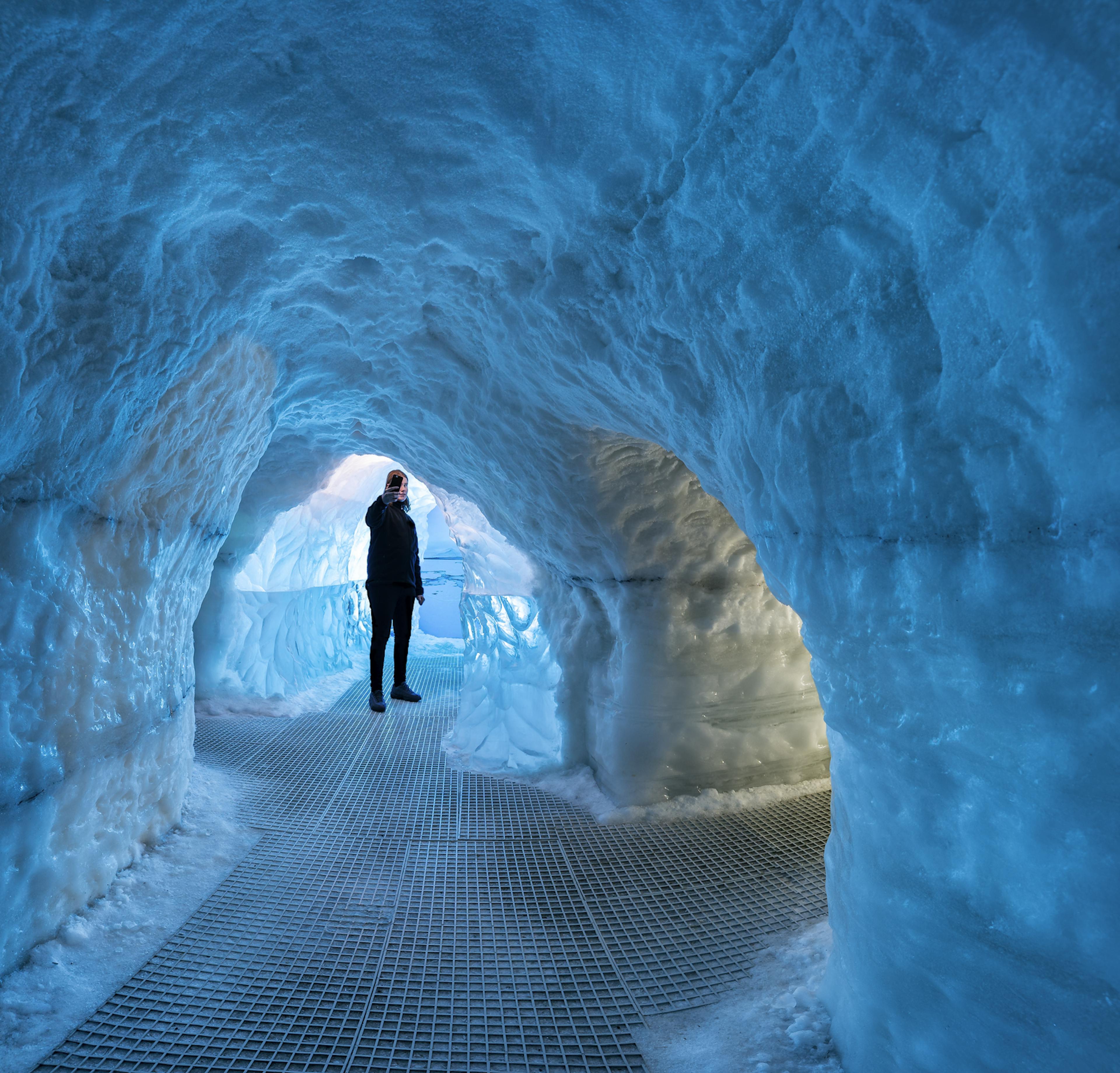 Man exploring Ice cave in Reykjavik
