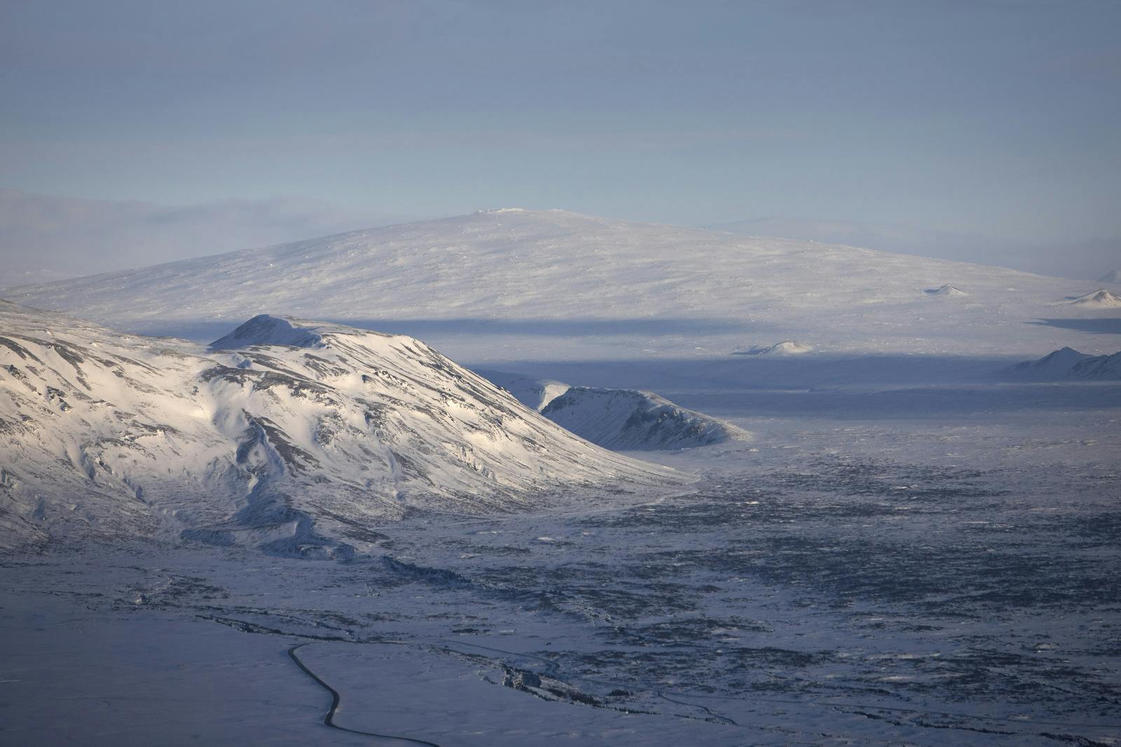 Shield volcano covered in snow