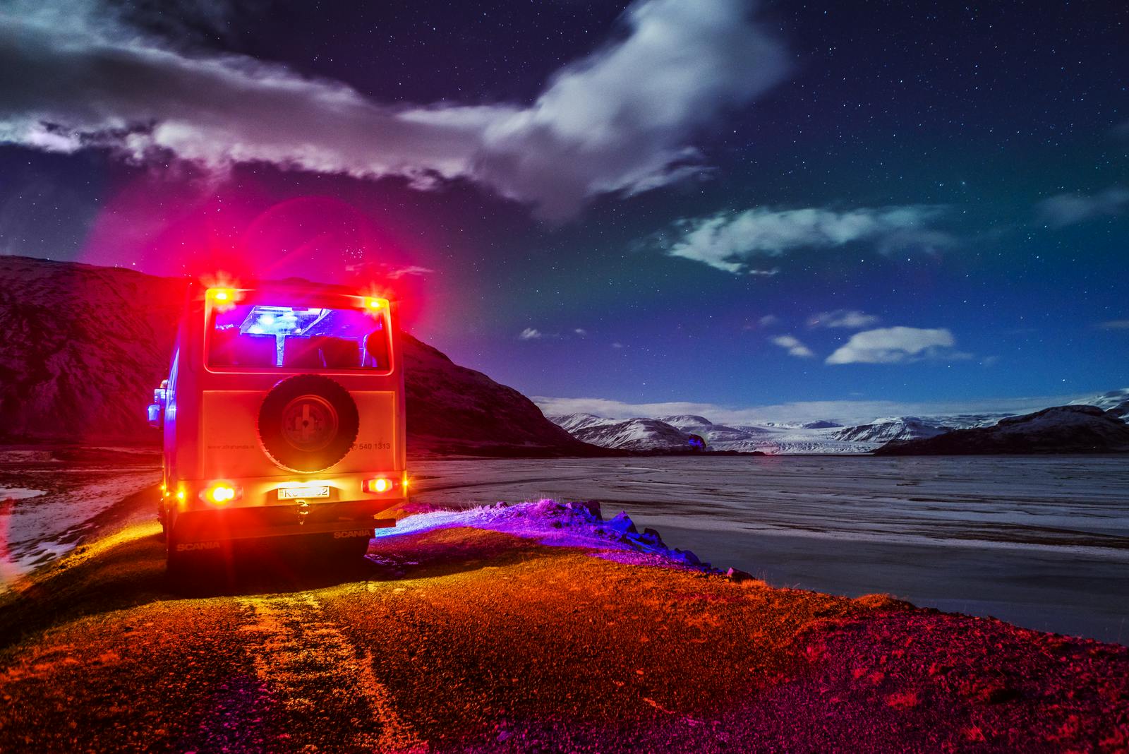 a tourist bus stopped to see a glacier