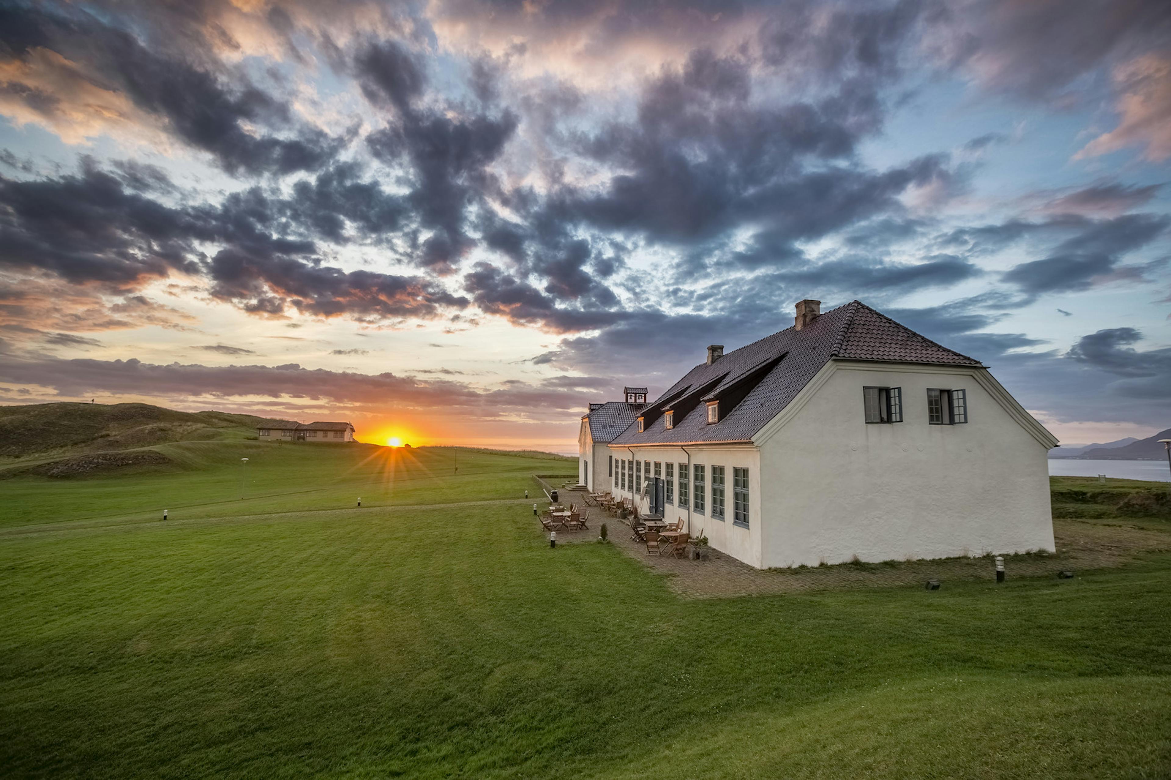 House Viðeyjarstofan, on Viðey at sunset