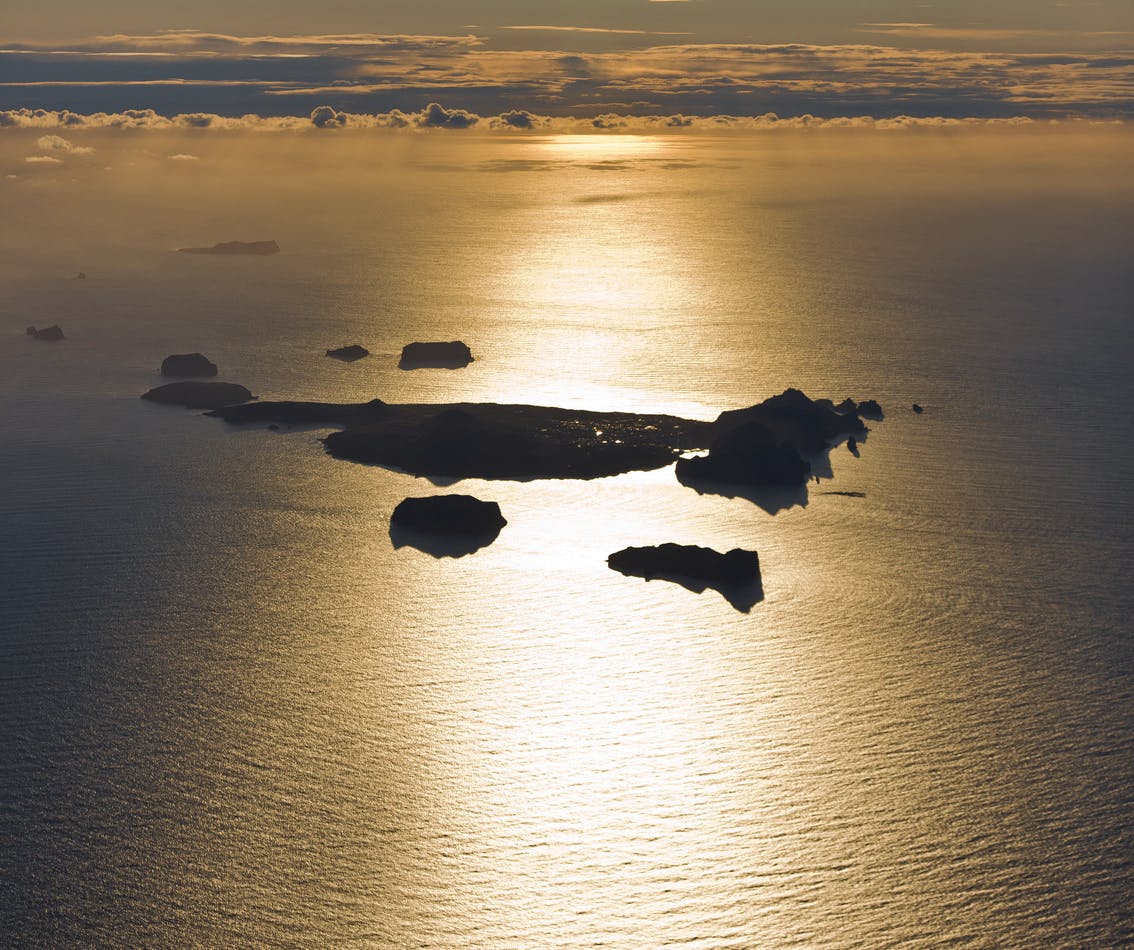 Sunset over Surtsey island