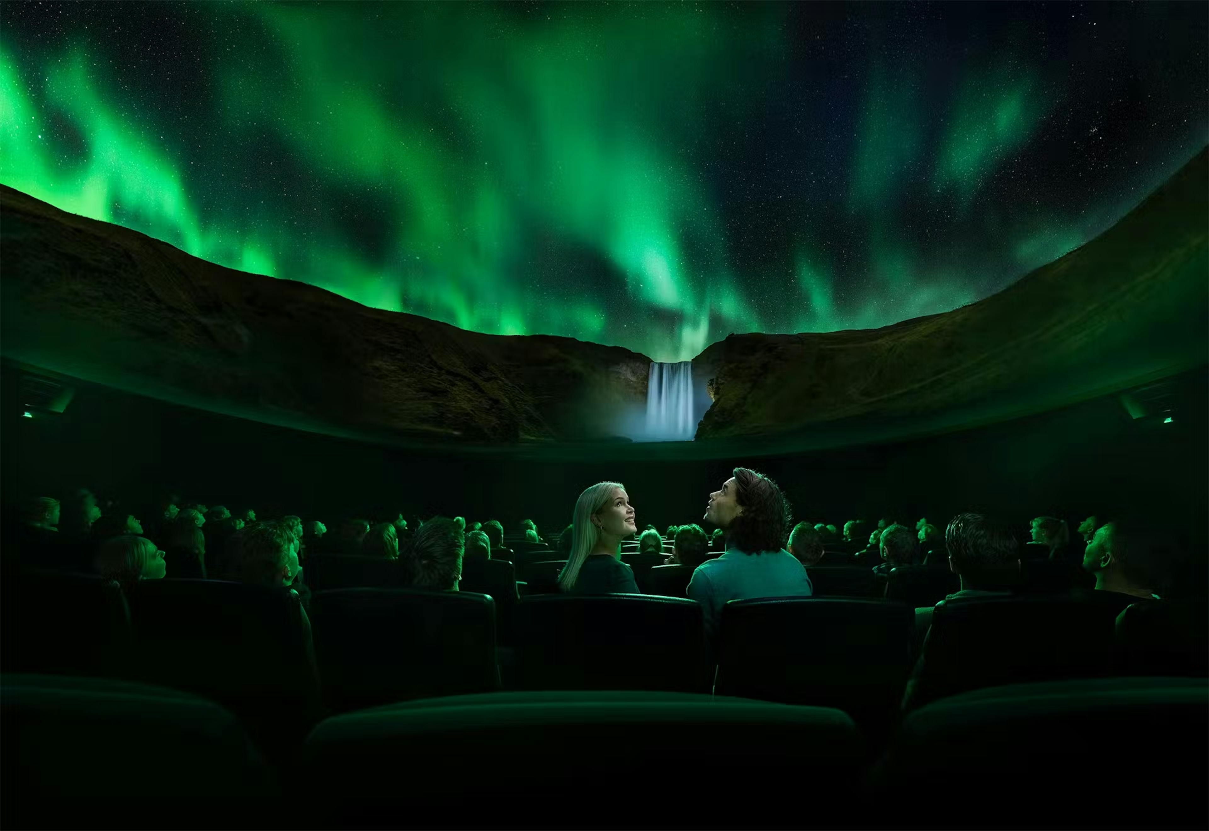 Couple at Northern Lights show in Reykjavik 