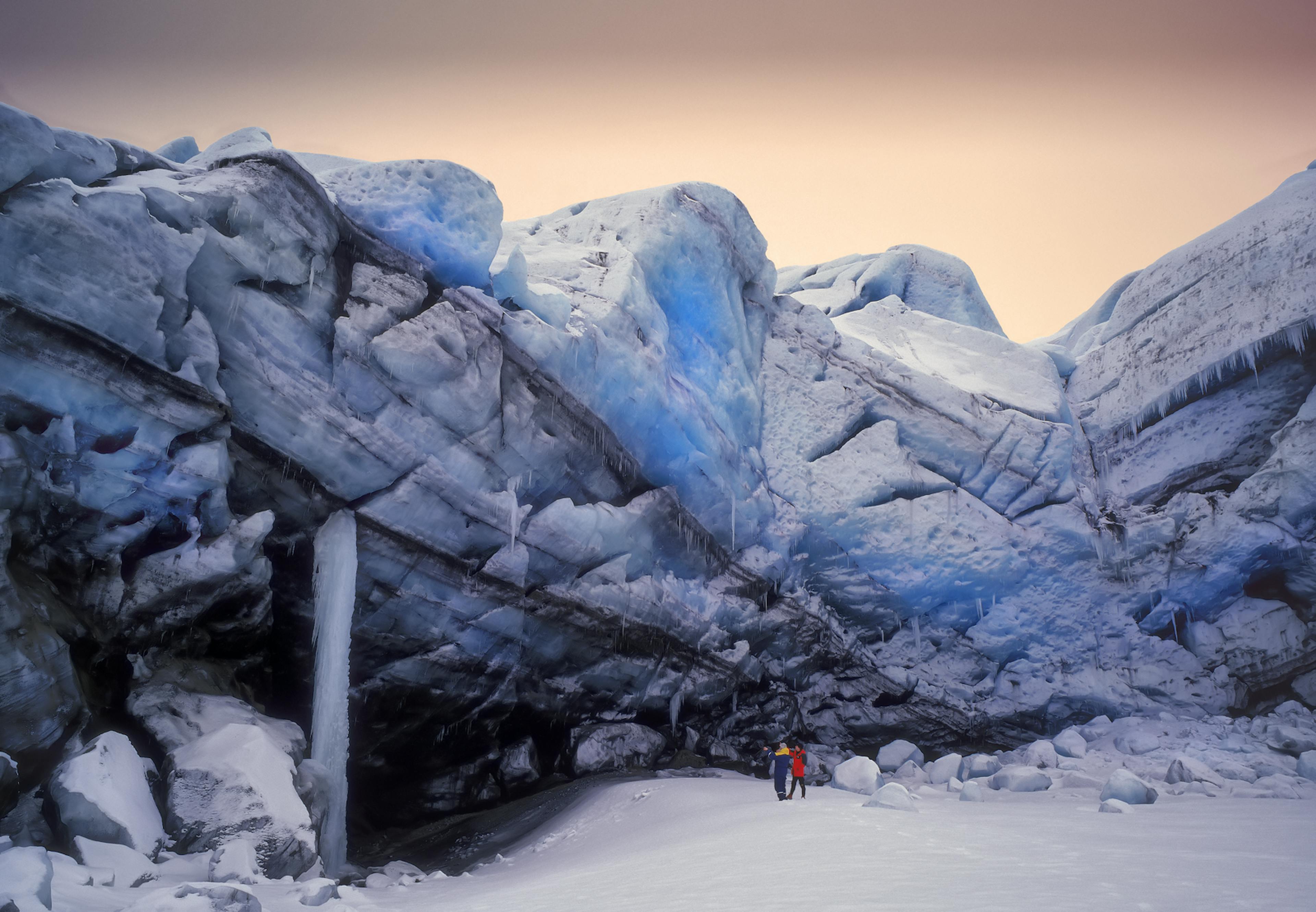 Two tourists on Skeiðarárjökull Glacier